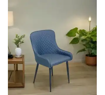 Modern blue chair with diamond-tufted back for rent | Estajer