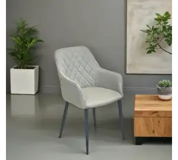 Modern light gray chair with diamond-tufted back for rent | Estajer