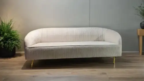 Large circular sofa upholstered in luxurious fabric with golden legs - Image 2 for rent | Estajer