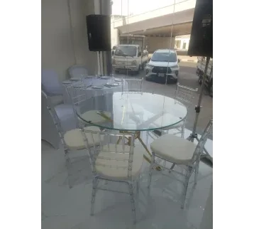 Luxury French Hosting Set – Glass Table with 8 Acrylic Royal Chairs for rent | Estajer