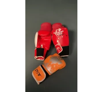  قفازات ملاكمة أحمر وبرتقالي – بروبس تصوير سينمائي للإيجار | استأجر