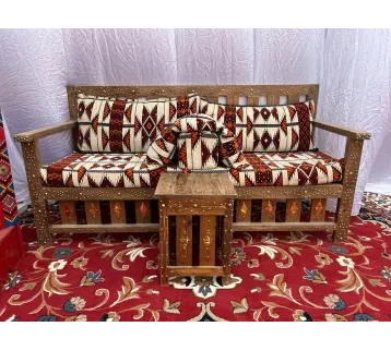 Wooden Arabic Majlis with a small wooden serving table for rent | Estajer