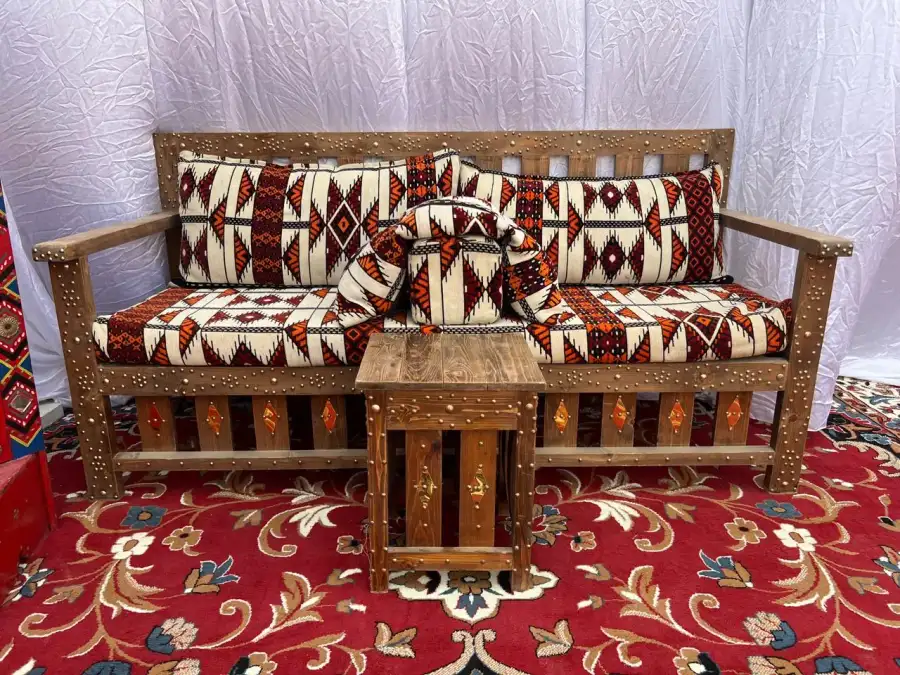 Wooden Arabic Majlis with a small wooden serving table - Main image for rent | Estajer